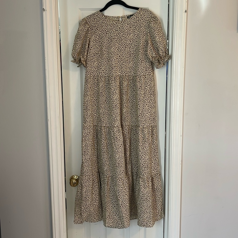 Brand new tags attached Pretty garden leopard print brown and cream dress.